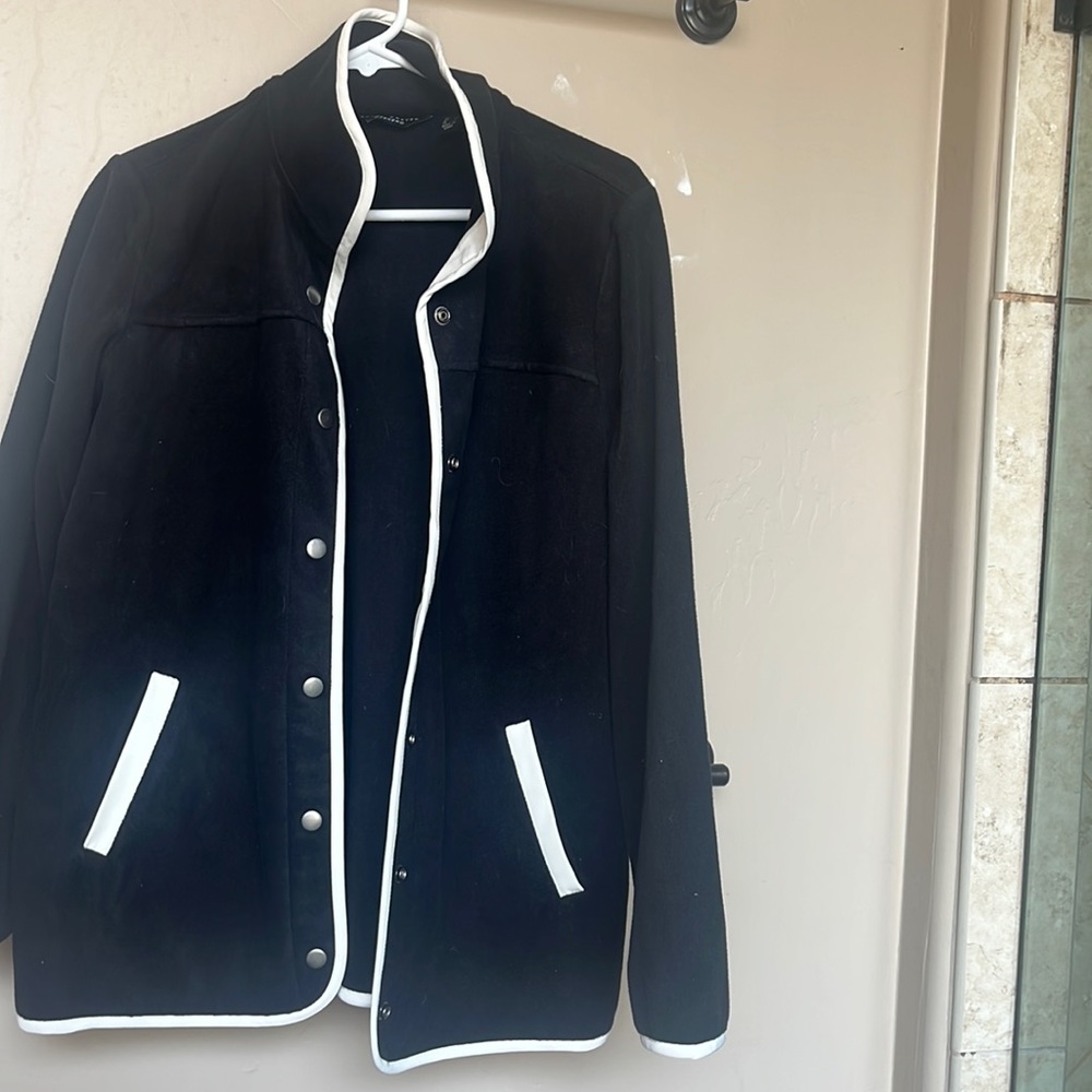 Light weight jacket. Never worn. Button up